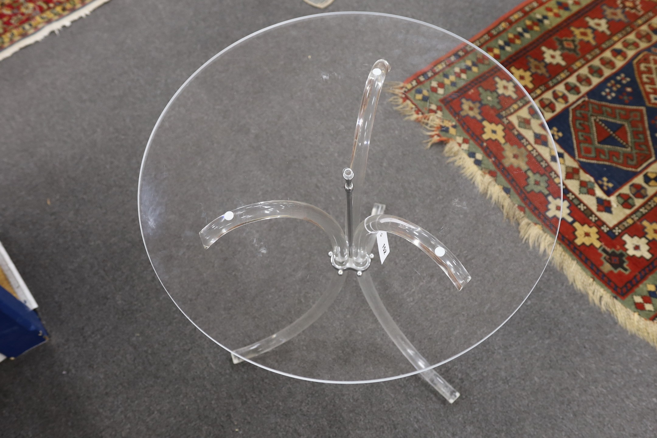 A Charles Hollis Jones style circular lucite tripod table, diameter 67cm, height 69cm